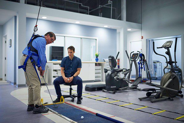 man golfing in Solo Step in physical therapy