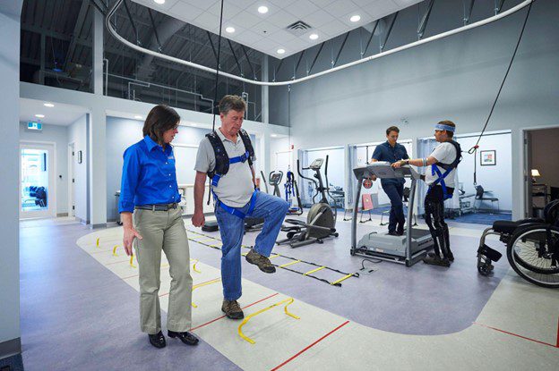 Man working with balance therapist and re-learning balance with the Solo Step system