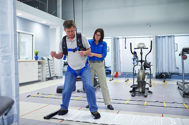 Man having gait training in physical therapy