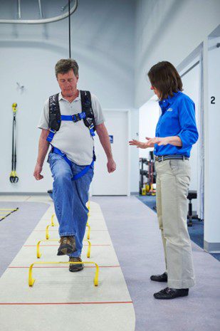 Man having gait training in physical therapy