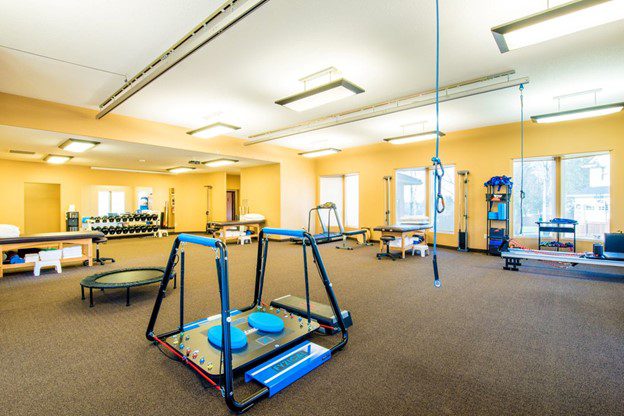 A room with physical therapy equipment